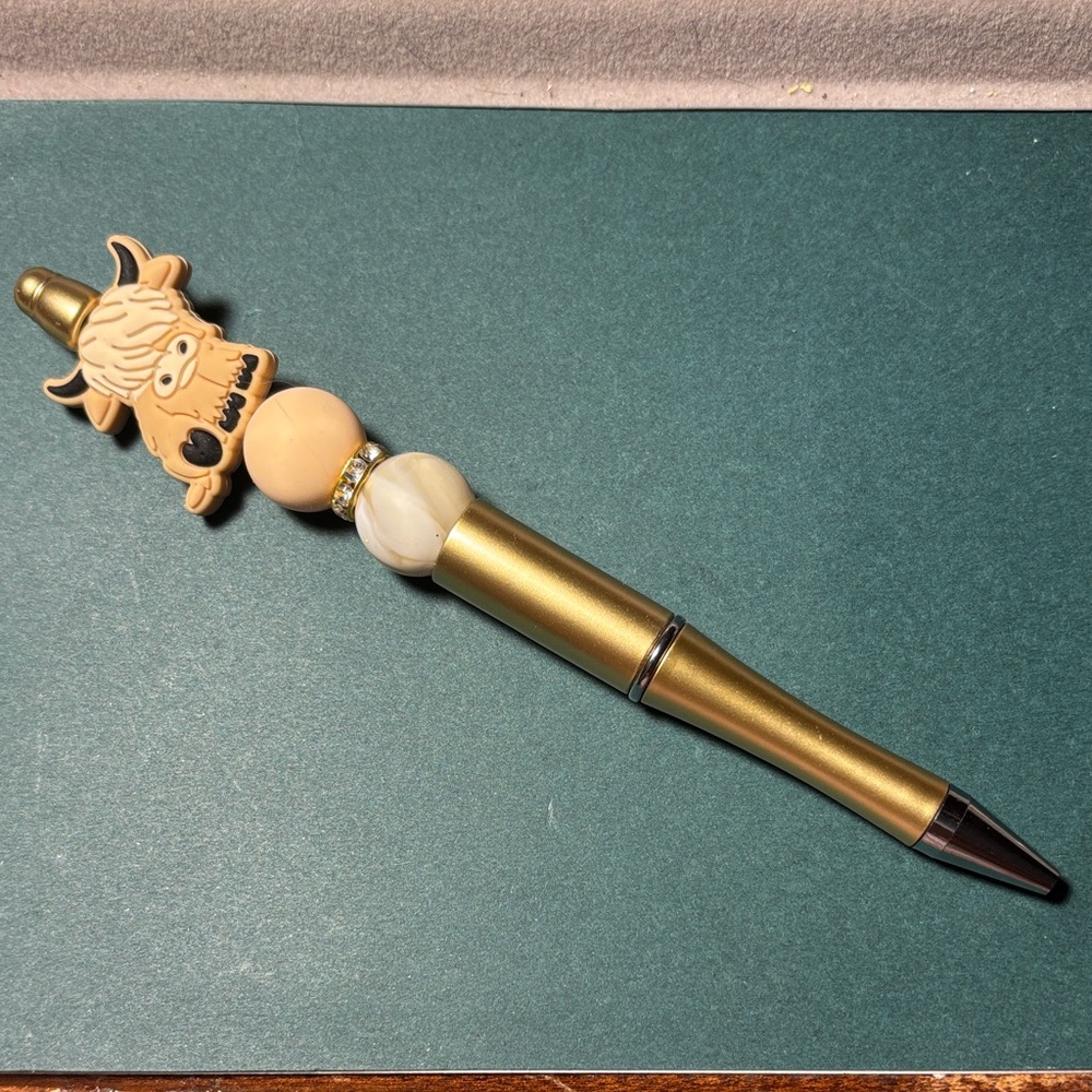 Handmade Gold and cream beaded pen highland cow topper